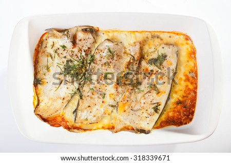 Baked trout with cream, shot from above.
