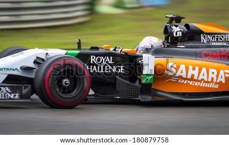 JEREZ, SPAIN - JANUARY 31: Daniel Juncadella test driving the new Force India  F1 car on the first Test at the Jerez Circuit in Jerez, Andalucia, Spain on Jan. 31, 2014.