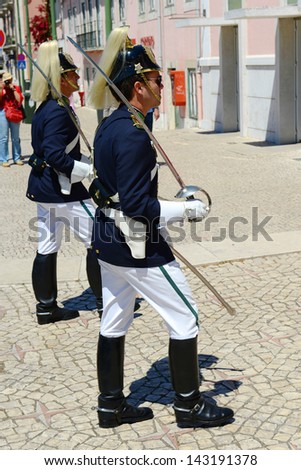 LISBON - JUNE 2: The Changing Guard Ceremony takes place in Palace of Belem on June 2, 2013 in Lisbon, Portugal. The ceremony is performed in every Sunday in the summer months.