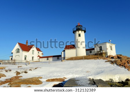 Eastern Point Lighthouse in winter, Cape Ann, northeastern Massachusetts, USA. This historic lighthouse was built in 1832 on the Gloucester Harbor entrance.