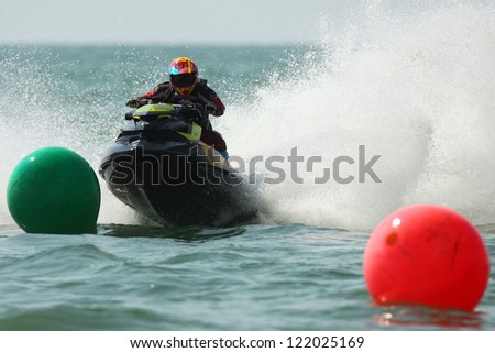 PATTAYA, THAILAND - DECEMBER 7 : Unidentified driver number 11 in the race of Jet Ski World Cup Grandprix 2012 on December 07, 2012 in Jomthein beach Pattaya, Thailand