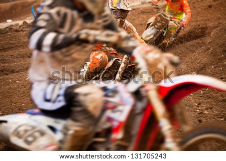 SI RACHA, THAILAND - MAR. 10 :Status of motocross riders during the MX2 race of The FIM Motocross World Championship Grandprix of Thailand, on March 10, 2013. Thailand.