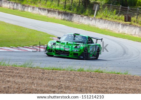 PATTYA, THAILAND-AUG.17 : Thanapol T drives Mazda (17) in Super car class 2 R 3 during the Thailand Super Series 2013 Round 3-4 at Bira International Circuit on August 17, 2013 in Pattaya, Thailand