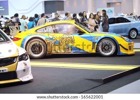 NONTHABURI - NOVEMBER 28: Porsche decoration and modify for racing by Sngha Team display on stage at The 30th Thailand International Motor Expo on November 28, 2013 in Nonthaburi, Thailand.