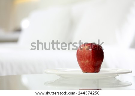 Apple  present for breakfast in the bedroom.