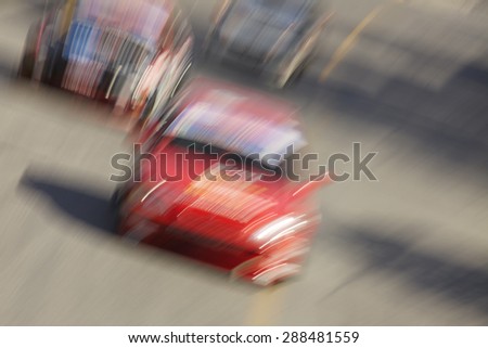 Abstract blurry of racing car in track.