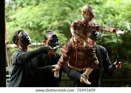 BANGKOK, THAILAND - MAY 1 : The little Thai puppet play requires the synchronized efforts of three puppeteers. They play at Klong Bang Loung on May 1, 2011 in Bangkok Thailand