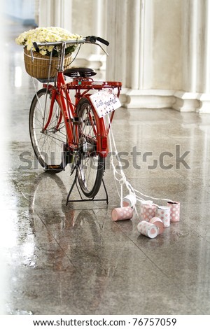 Just Married sign on a red bike