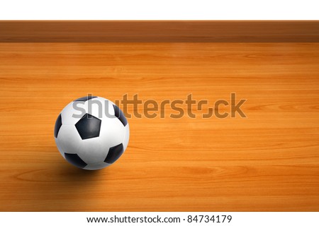 wall of room with a ball on wooden floor