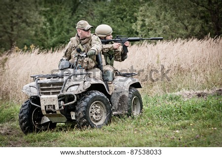 Soldiers on all terrain vehicle - fast response squad