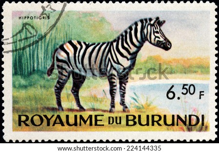 BURUNDI - CIRCA 1964: A stamp printed by BURUNDI shows Zebra - African equid (horse family) with distinctive black and white striped coats, circa 1964