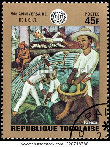 TOGO - CIRCA 1970: A stamp printed by TOGO shows painting Workers by a prominent Mexican painter Diego Rivera, circa 1970