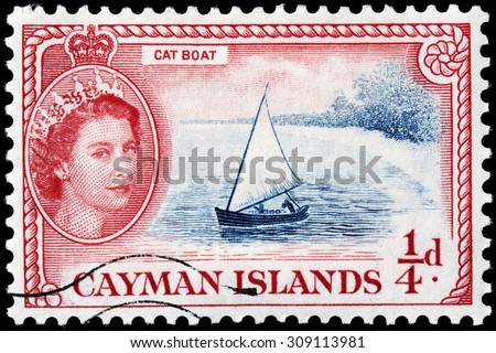CAYMAN ISLANDS - AUGUST 10, 2015: A stamp printed by CAYMAN ISLANDS shows a catboat - a sailing vessel characterized by a single mast carried well forward, circa February, 1955.