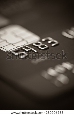 Image of money, credit cards, checks and coins. Black and white