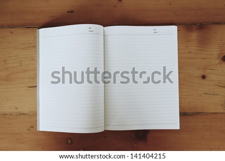 Notebook paper on desk