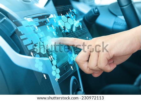 Car driver hands with GPS, Pushing on car screen interface with entering an address into the navigation system