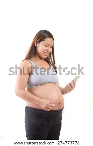 Pregnant woman listening her baby heart sound