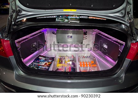 BANGKOK - DECEMBER 4: Car Audio Show Installation in Mazda 2 car audio booth at the 28th Thailand International Motor Expo on December 4, 2011 in Bangkok, Thailand.