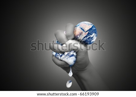 stock photo : Squeezing the Earth