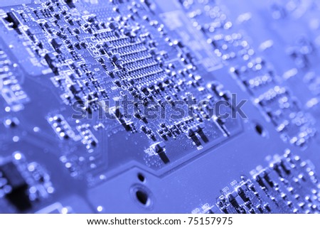 Electronic circuit board as background - blue filter and hard light