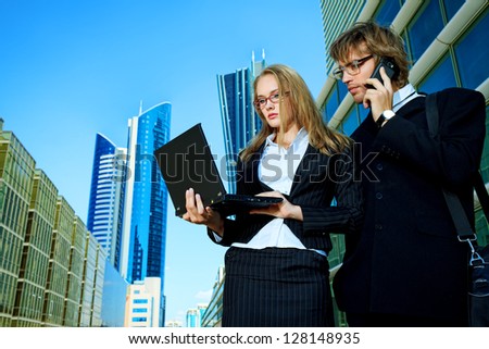 Modern business people are working together in the big city.