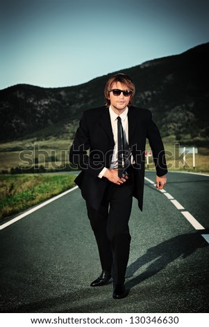 Businessman is running on the highway. Business struggle concept.