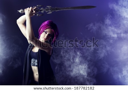 Beautiful girl warrior with a sword standing in fighting stance. Anime. Fantasy.