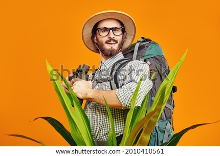 Image, Stock Photo Hipster man in jungle with guitar