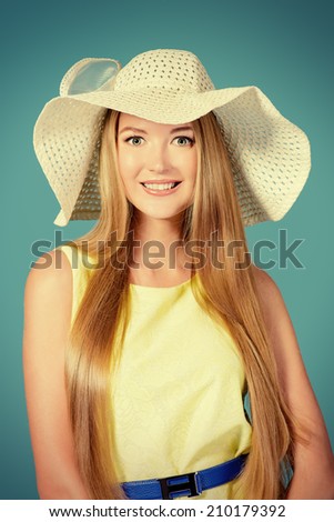 Beautiful smiling girl in summer clothes. Vacation.