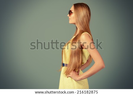 Beautiful girl in summer clothes and sunglasses.