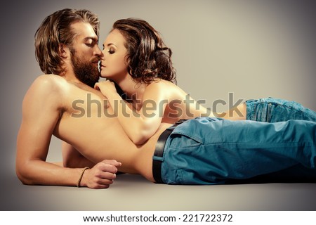 Beautiful loving young people kissing. Passion. Love concept.