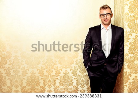Portrait of a handsome mature man in elegant suit. Fashion, beauty.