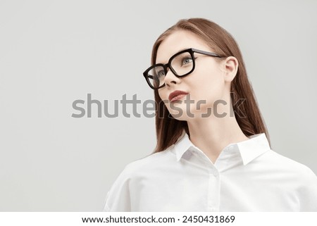 Image, Stock Photo Serious female with makeup and freckles on nose gently and looking at camera