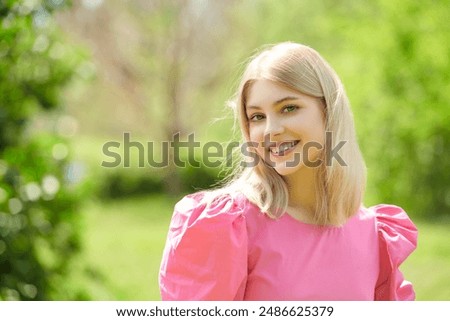 Similar – Image, Stock Photo A beautiful blonde girl in this one. Dressed in red summer dress and looking all pretty. Enjoying wild nights of summer. A portrait of true beauty.