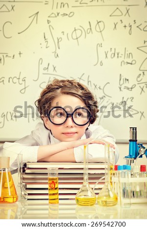 Student girl doing research in the laboratory. Science and education.