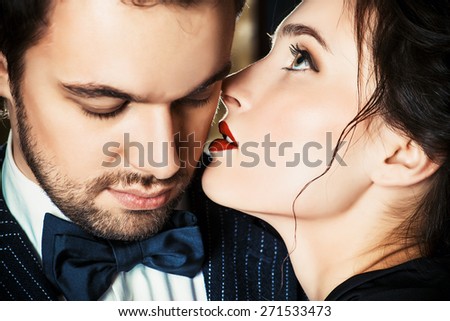 Close-up portrait of a beautiful man and woman in love. Fashion. Love concept.