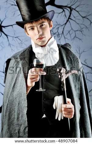 http://image.shutterstock.com/display_pic_with_logo/67164/67164,1268821795,14/stock-photo-portrait-of-a-young-gentlemen-wearing-dinner-jacket-and-black-top-hat-shot-in-a-studio-48907084.jpg