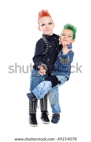 Shot of two little boys posing in costumes of rock musicians. Isolated over white background.