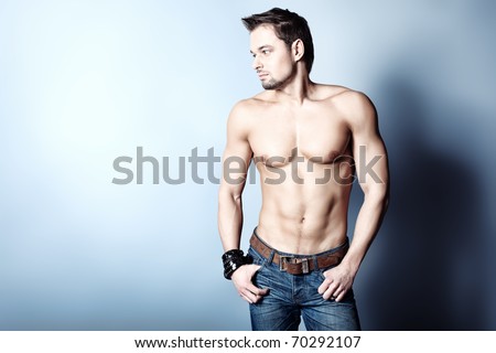 Portrait of a handsome muscular young man. Shot in a studio.