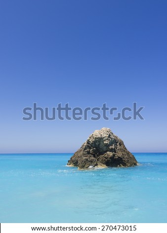 Paradise bay beach, untouched nature abstract archipelago in seashore with rocks in water on island Lefkada or Lefkas or Leukas, is a Greek island in the Ionian Sea on the west coast of Greece