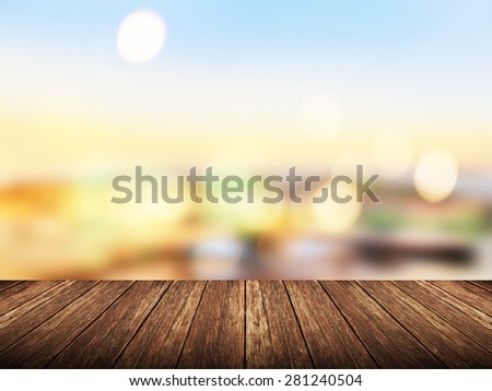 Empty wood table over blurred city light with bokeh background, product display template,deck,