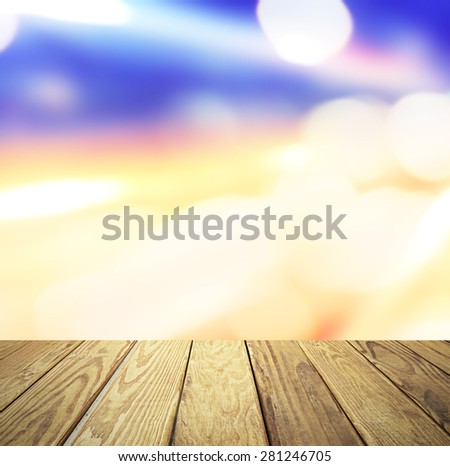 Empty wood table over blurred star light bokeh background, product display template,deck,sky,city lights