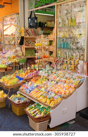 SORRENTO, ITALY - JUNE 26, 2015: A colorful display outside a store in Sorrento,  selling different citrus soaps and souvenirs made from lemons famous in Southern Italy