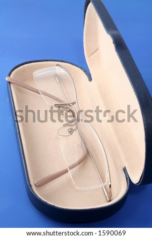 corrective eyeglasses inside case