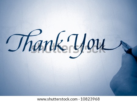 person writing thank you in calligraphy in blue tone