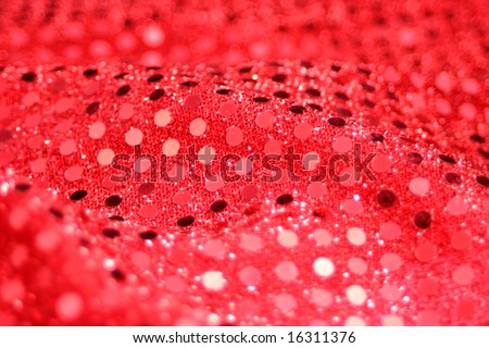 close-up of red material with sequins, great for a background