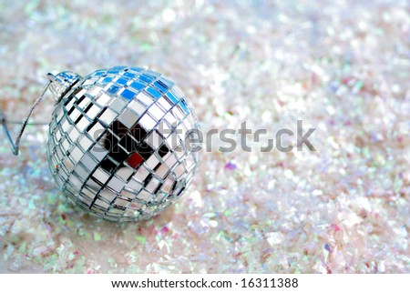 disco ball  decoration on white glitter great for backgrounds,  tags or greeting card