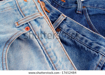 pile of different shades of blue jeans