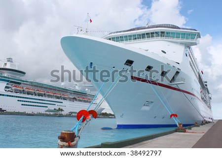 Cruise ships in the clear blue Caribbean ocean docked in the port of Nassau, Bahamas