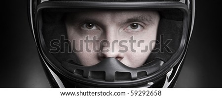 Closeup portrait of a man in helmet